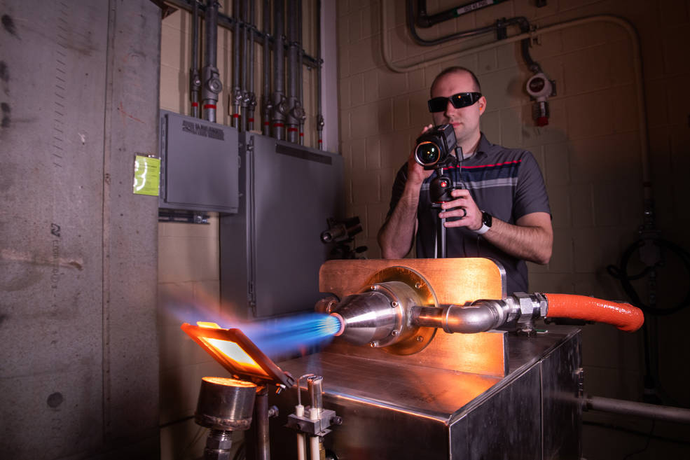 Nasa engineer adjusting thermal imaging camera